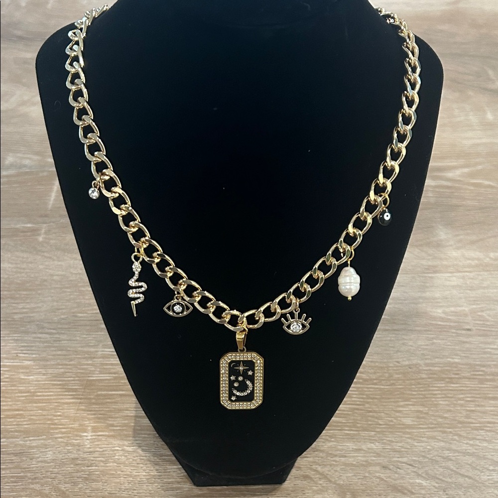 Gold Charm Necklace with Black Accents